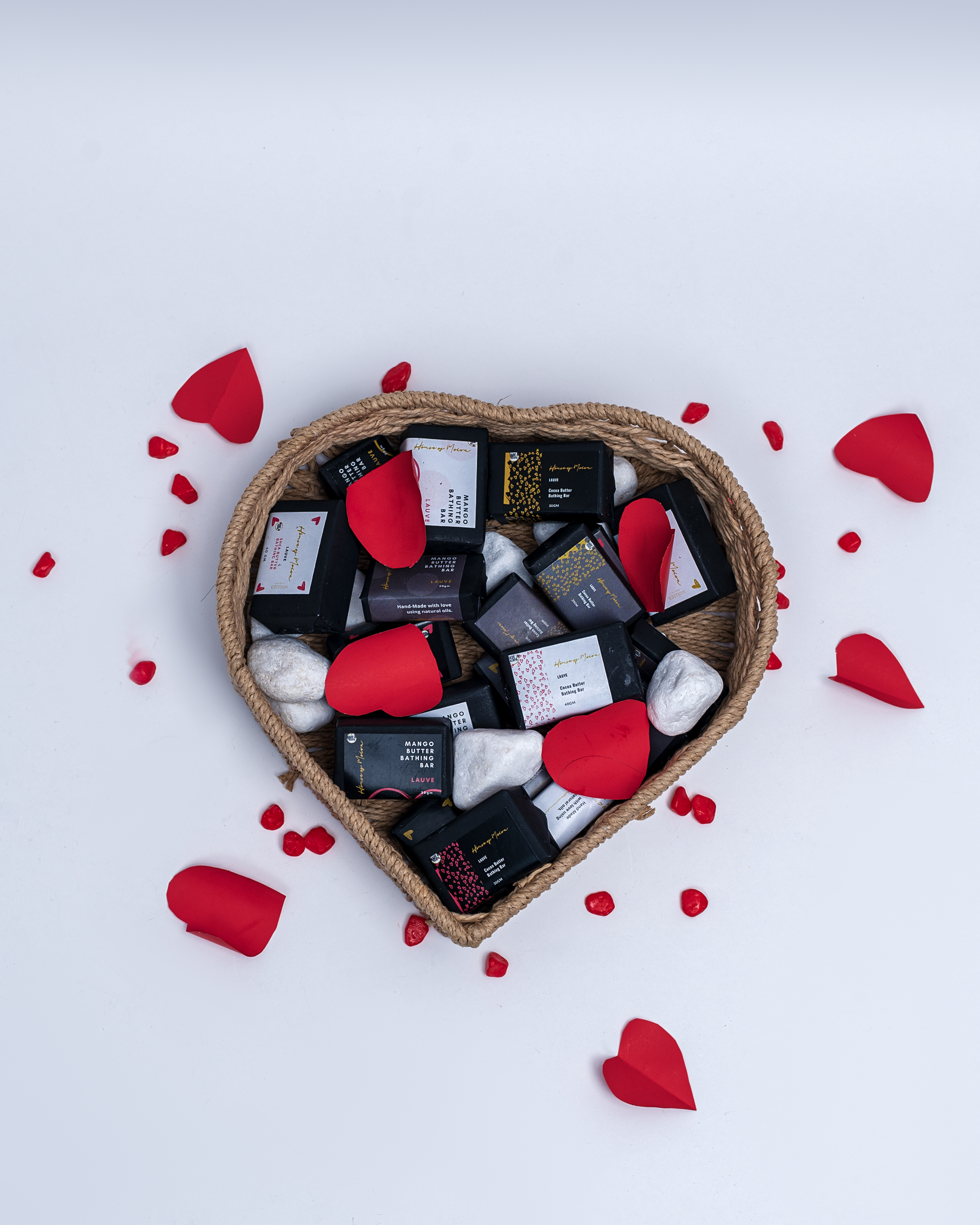 top-dwon pic of house of moira bathing bars in heart shaped basket